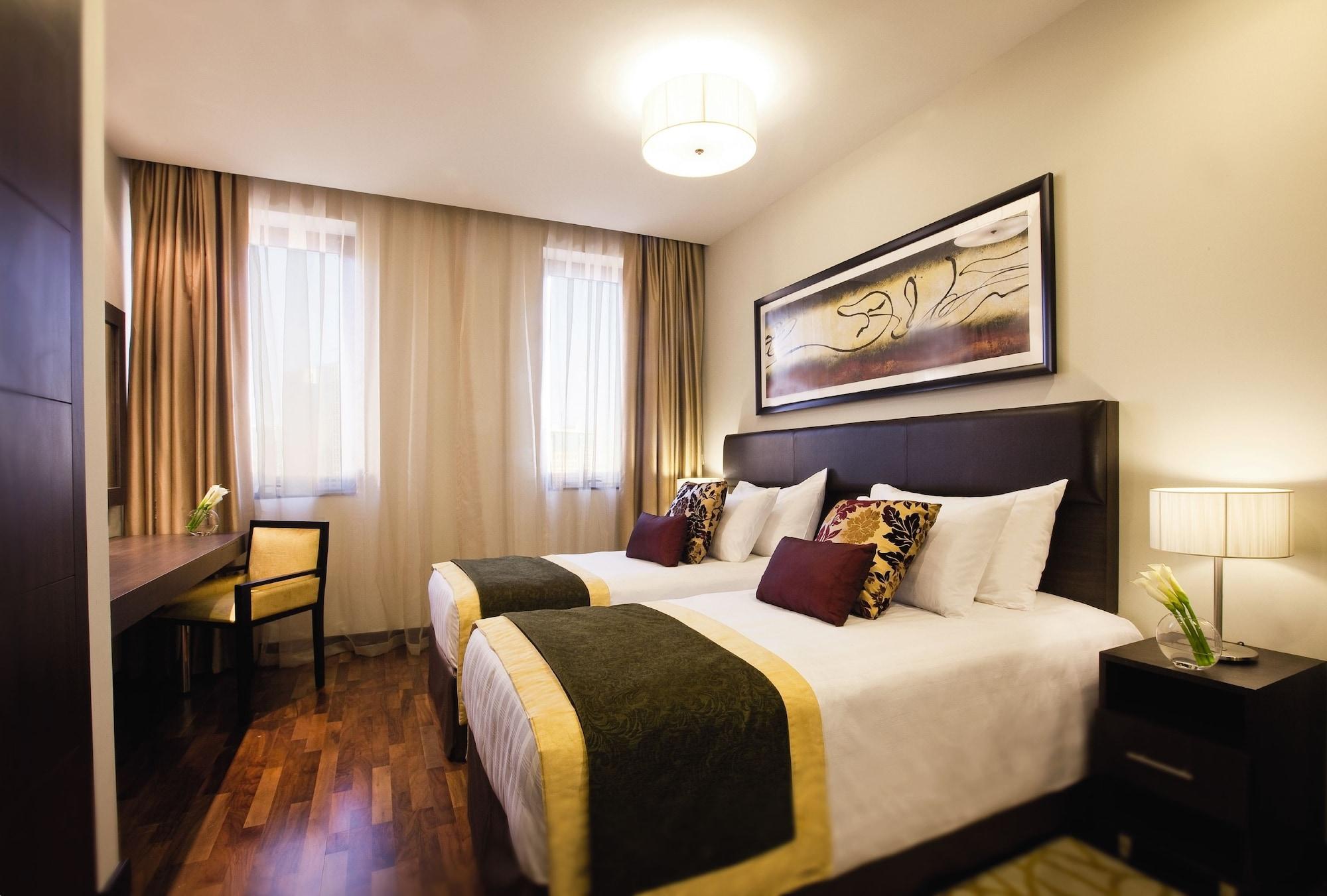 Moevenpick Hotel Apartments Al Mamzar Dubai Luaran gambar Deluxe Room