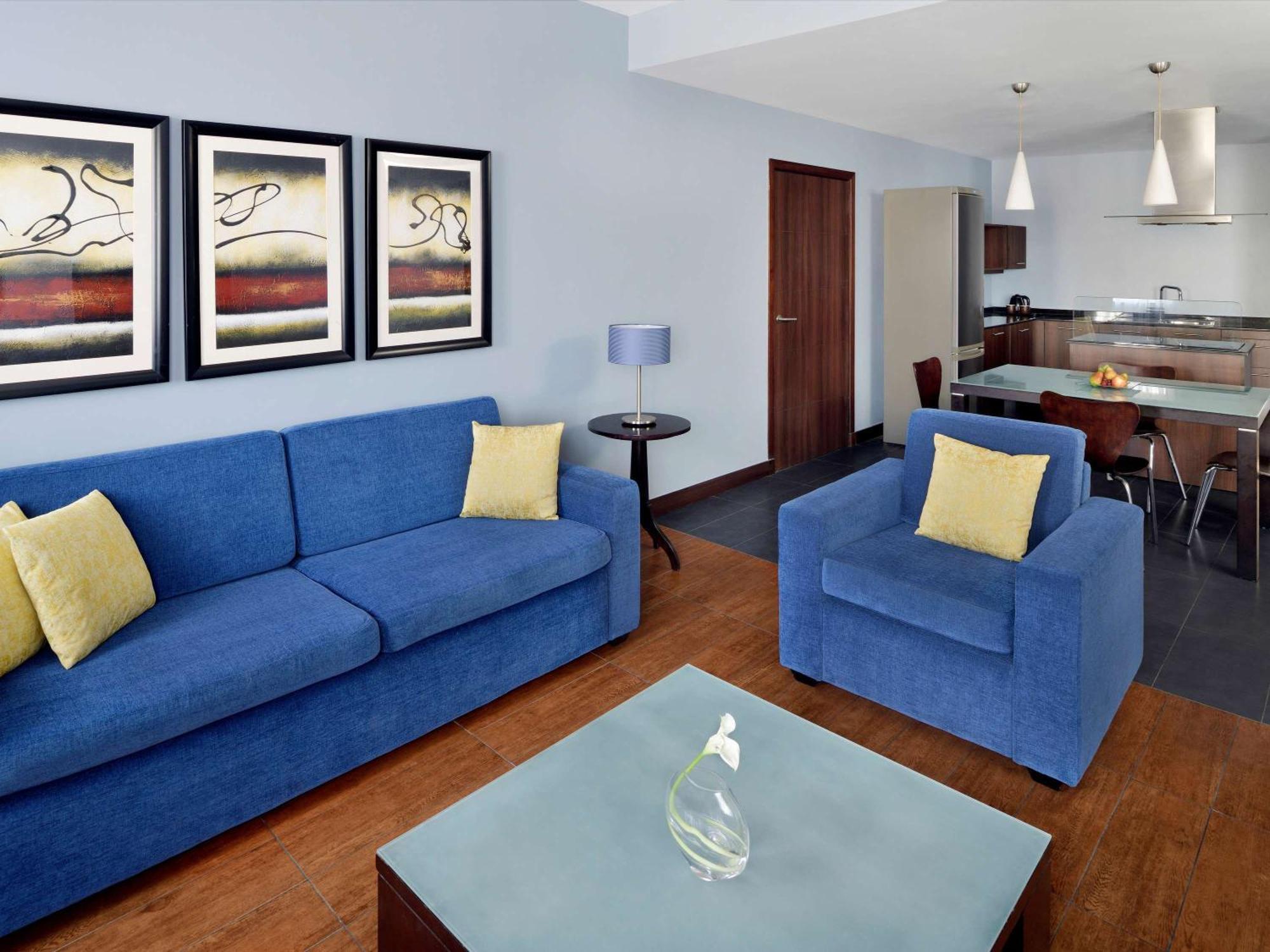 Moevenpick Hotel Apartments Al Mamzar Dubai Luaran gambar A typical apartment at the complex